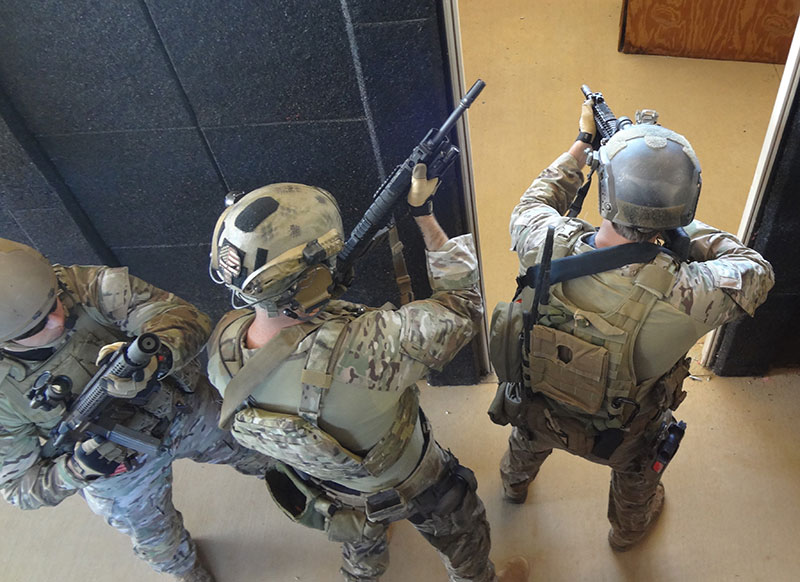 Allowing number one man time to pie off the door and shoot any visible threats before he enters and clears a corner has proven more effective and (safer) in combat.