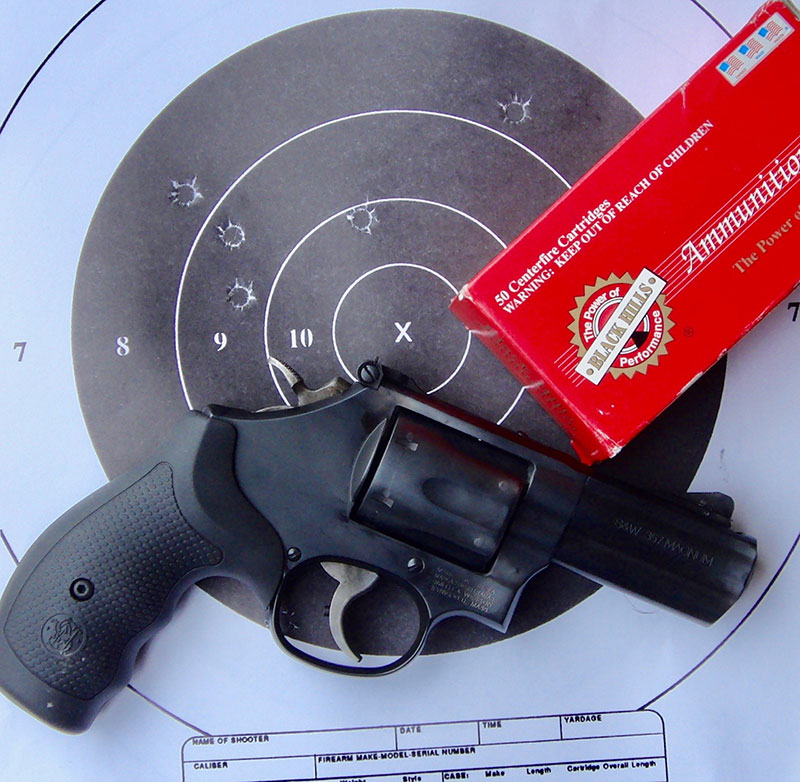 Four-inch, five-shot group at 25 yards using Black Hills 158-grain SWC. Four shots went into two inches, with one pulled a little high and right.