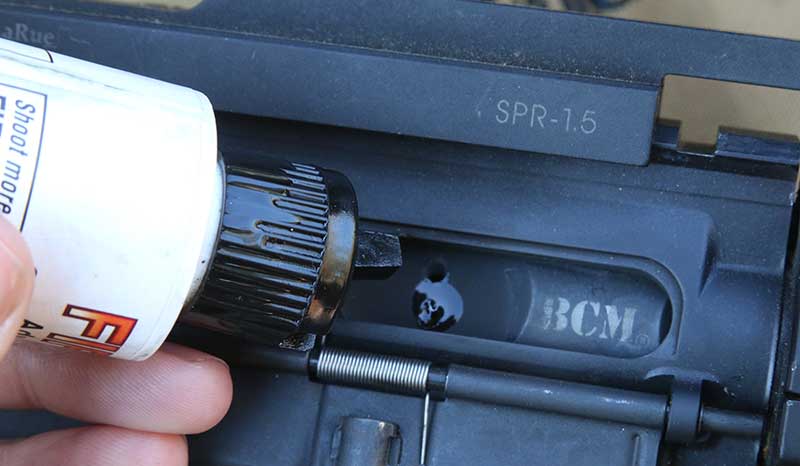 One drop through each vent hole and another at junction of bolt and carrier is the in-stride answer to keeping a rifle running. With only three drops of FIREClean, rifle came back to solid function after first harsh cycle and ran for another 580 rounds.