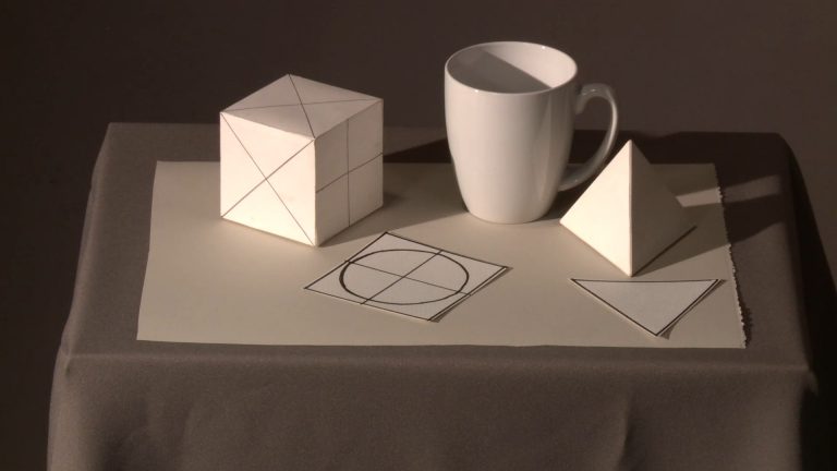 3D objects atop paper
