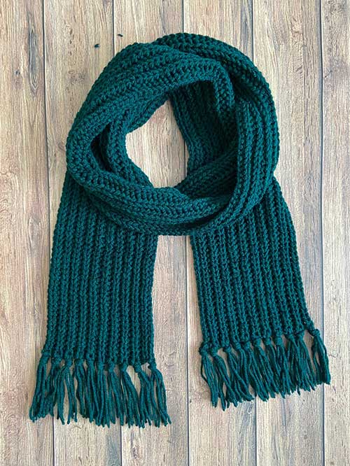 green ribbed crochet scarf