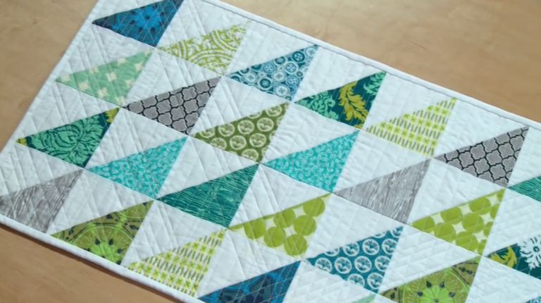 blue white and teal quilted table runner