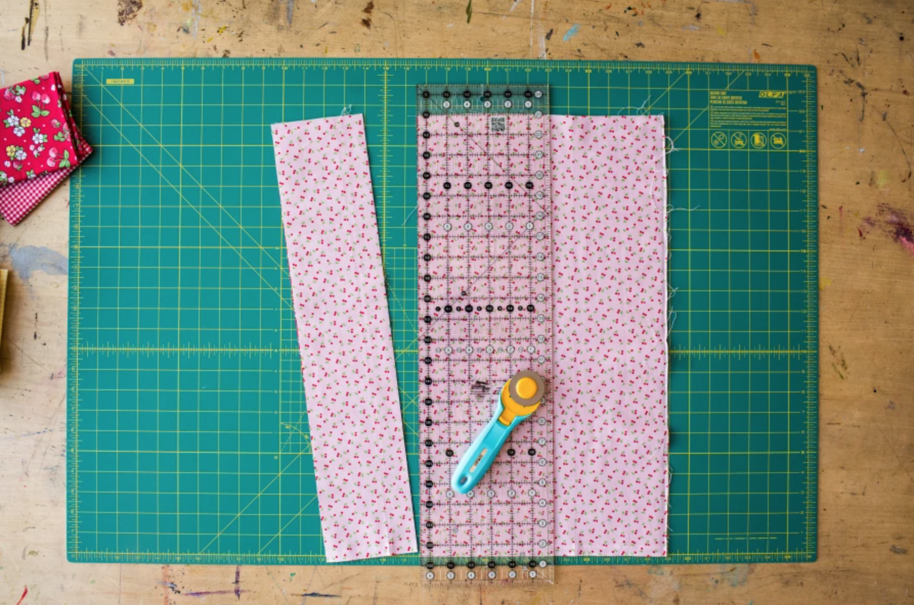 cutting mat with fabric and rotary cutter