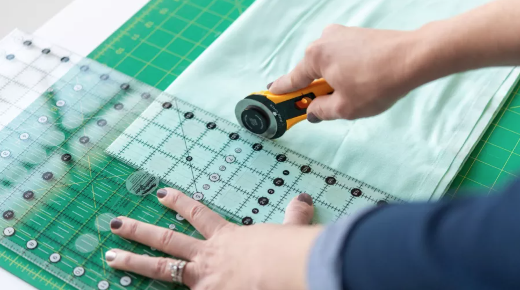 cutting fabric with ruler and rotary cutter