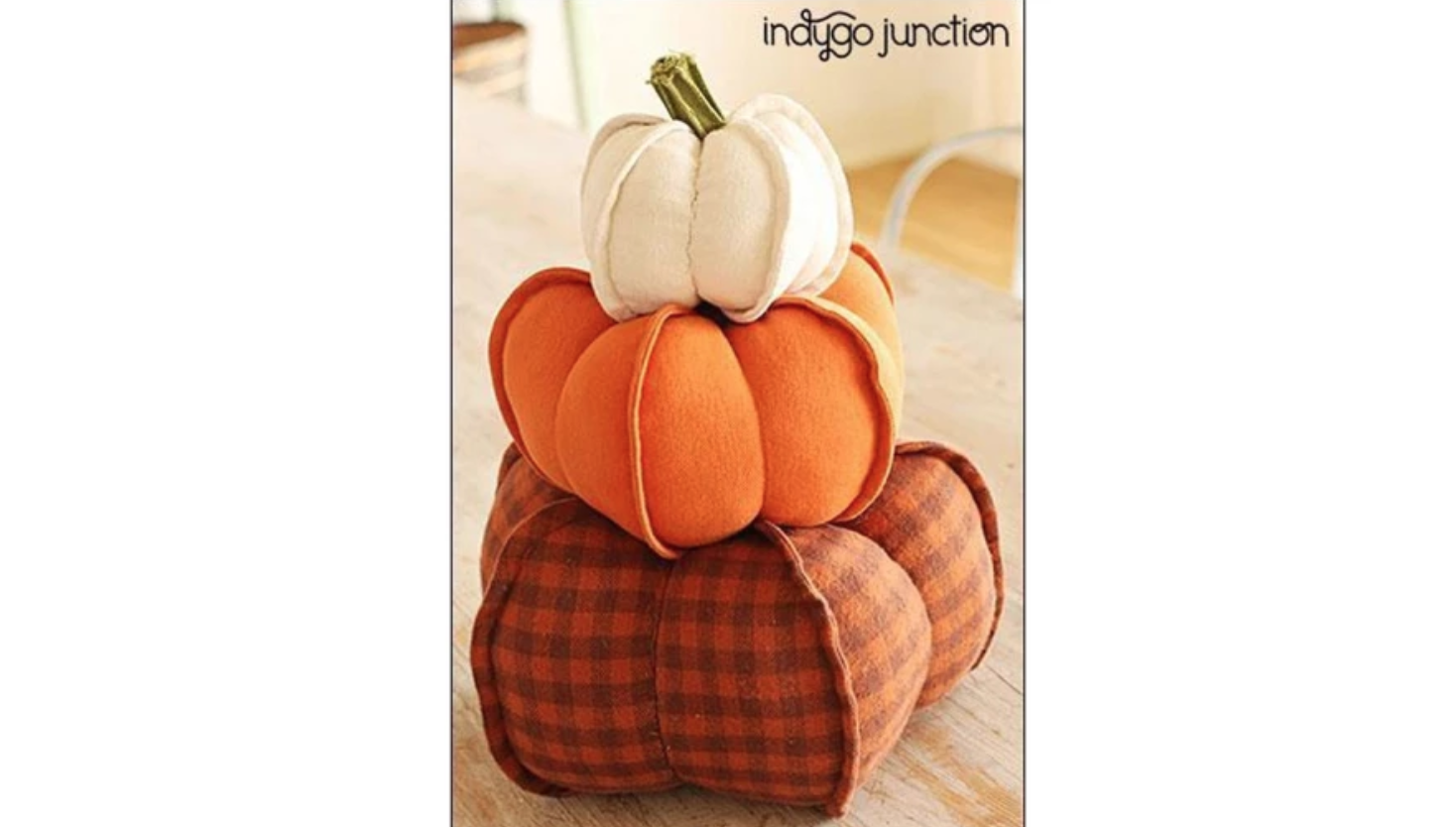 three fabric pumpkins stacked