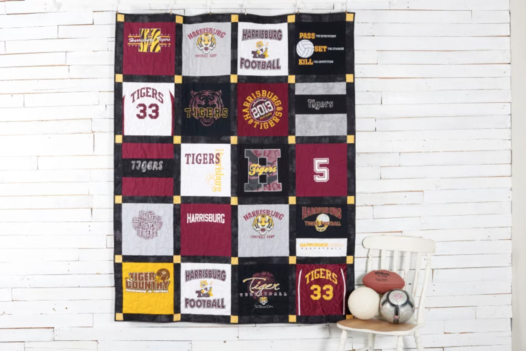 t-shirt quilt hanging on a wall