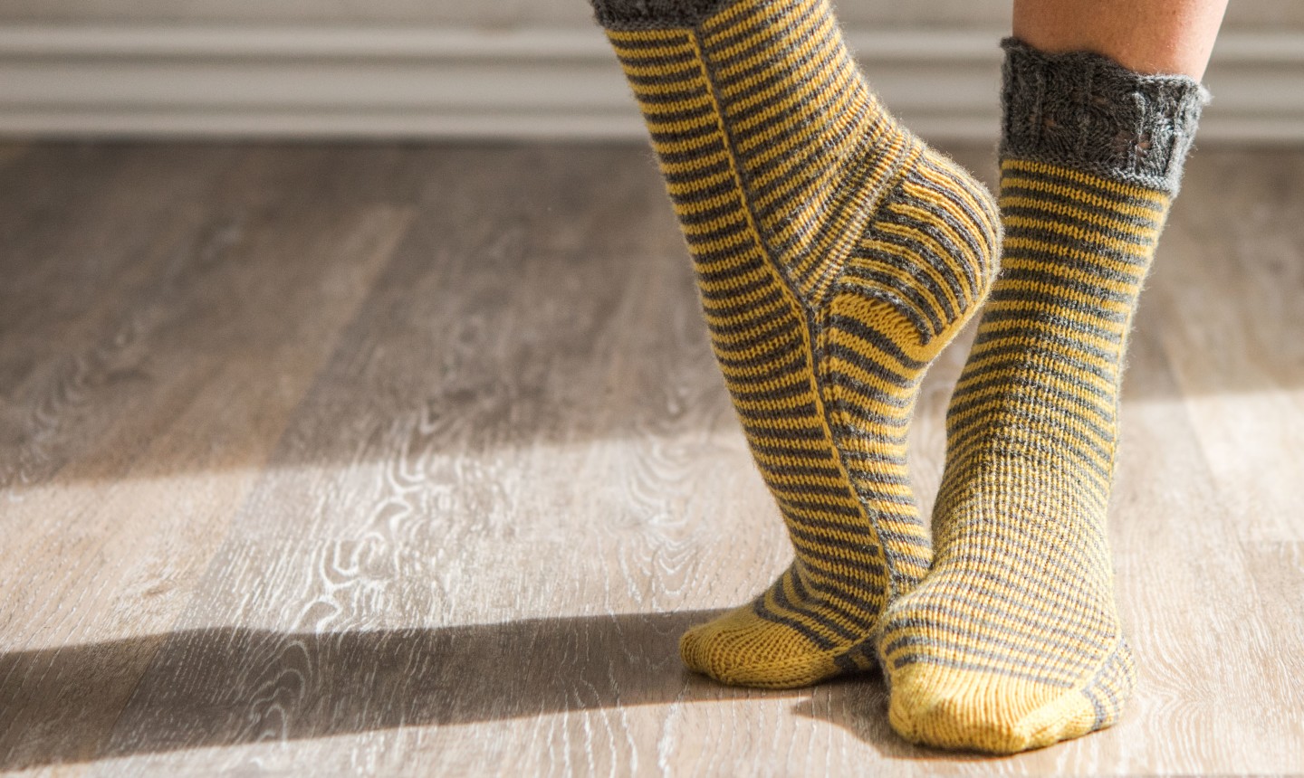 gold and gray striped socks