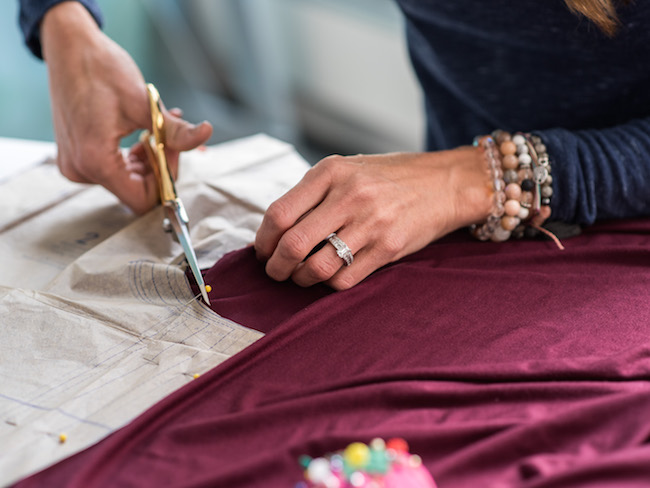 woman sewing on machine