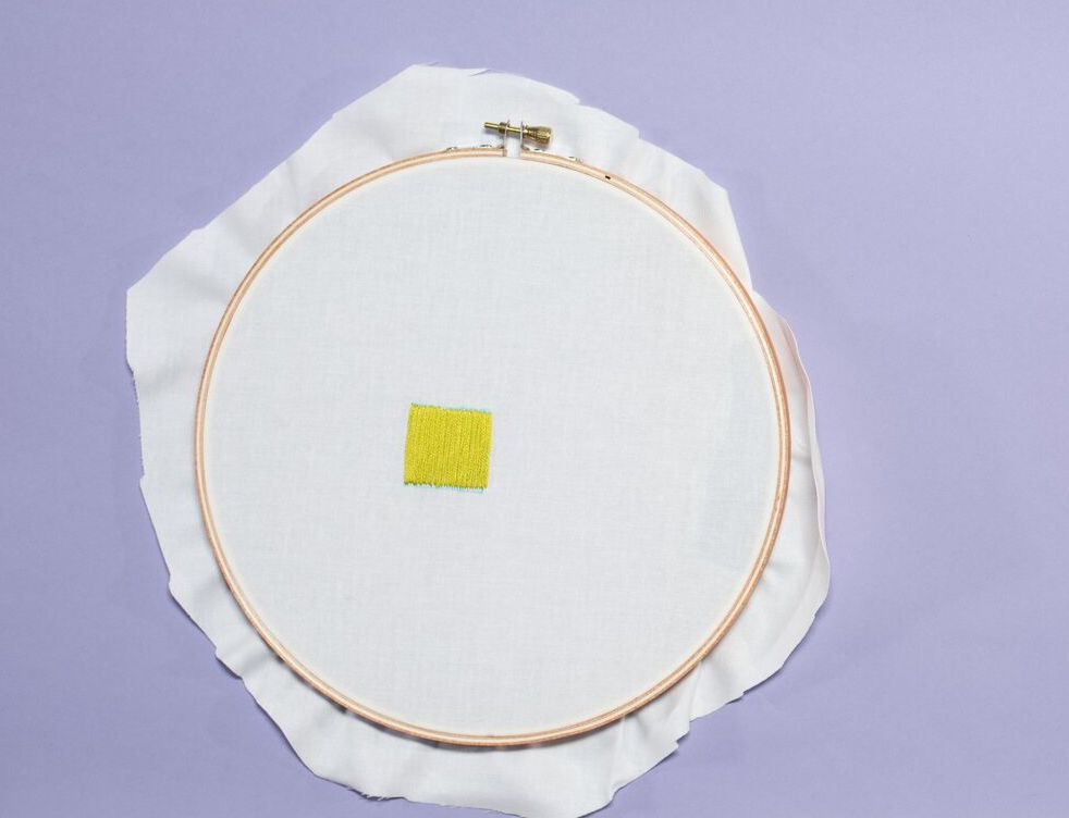 Yellow satin stitch square