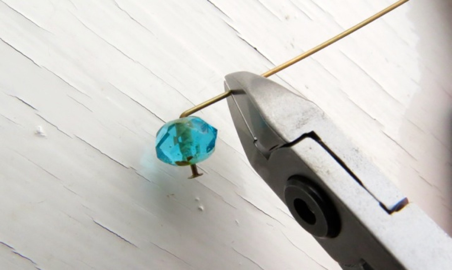 clipping wire in blue bead