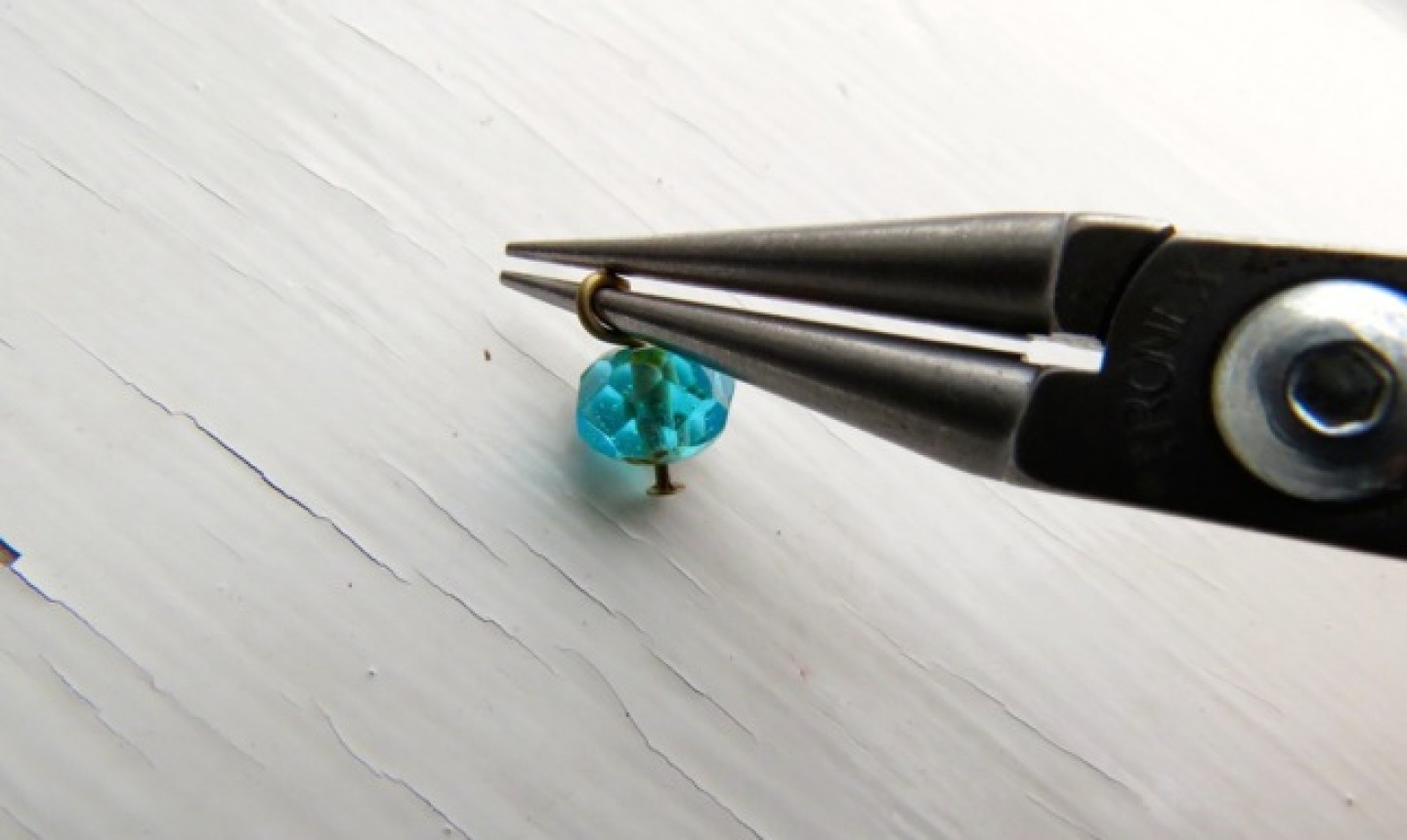 turning wire in bead