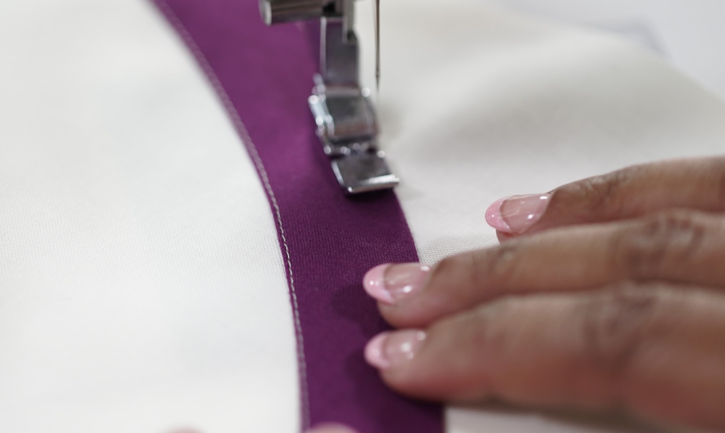 sewing purple bias tape