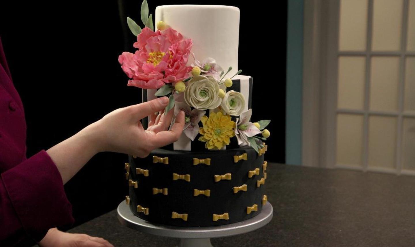 black and white cake with flowers