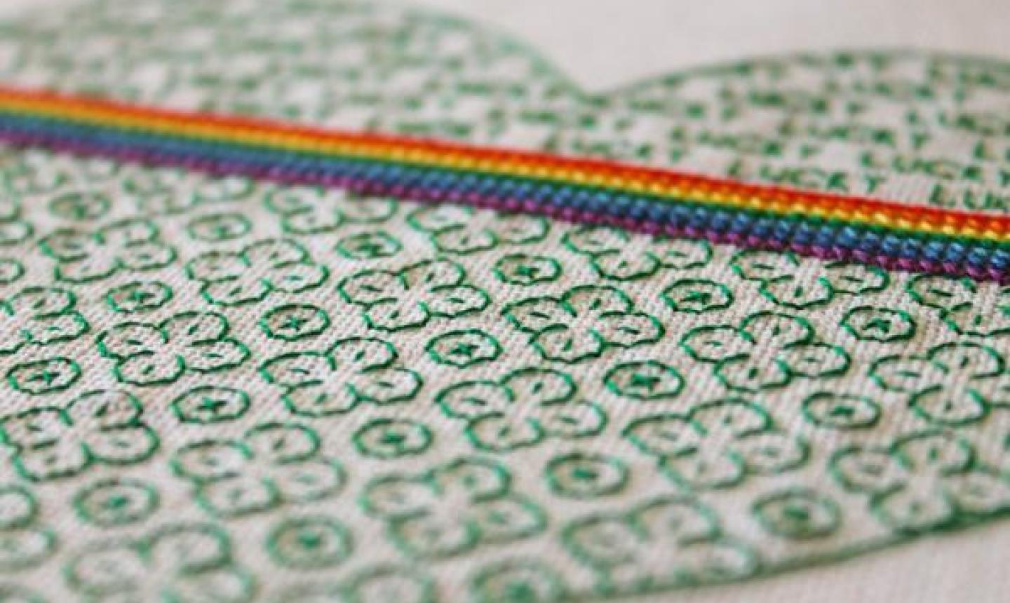 green and rainbow blackwork embroidery