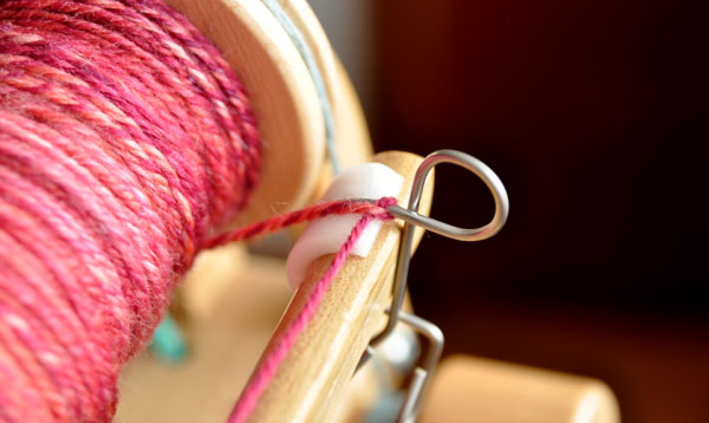 winding yarn onto spinning wheel