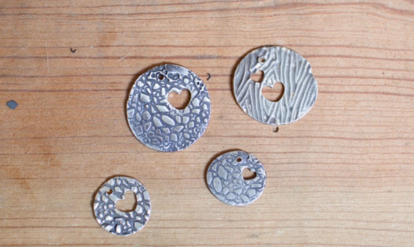 textured clay pendants