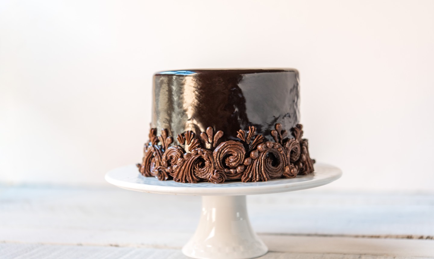 chocolate cake on cake stand