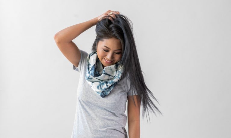 woman wearing infinity scarf