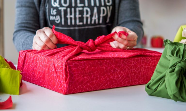 wrapping gift in fabric