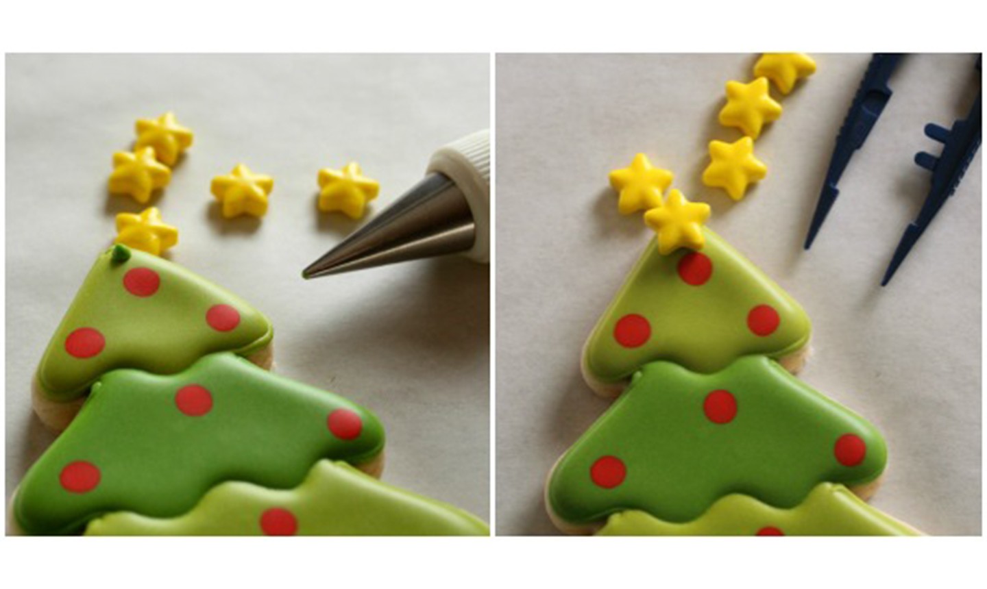 adding star sprinkle to christmas tree cookies