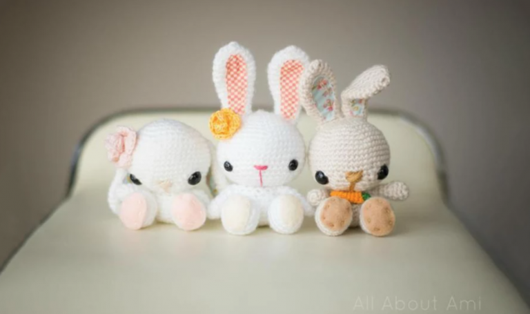 three amigurumi bunnies