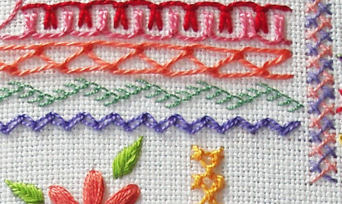 detail embroidery stitches on sampler