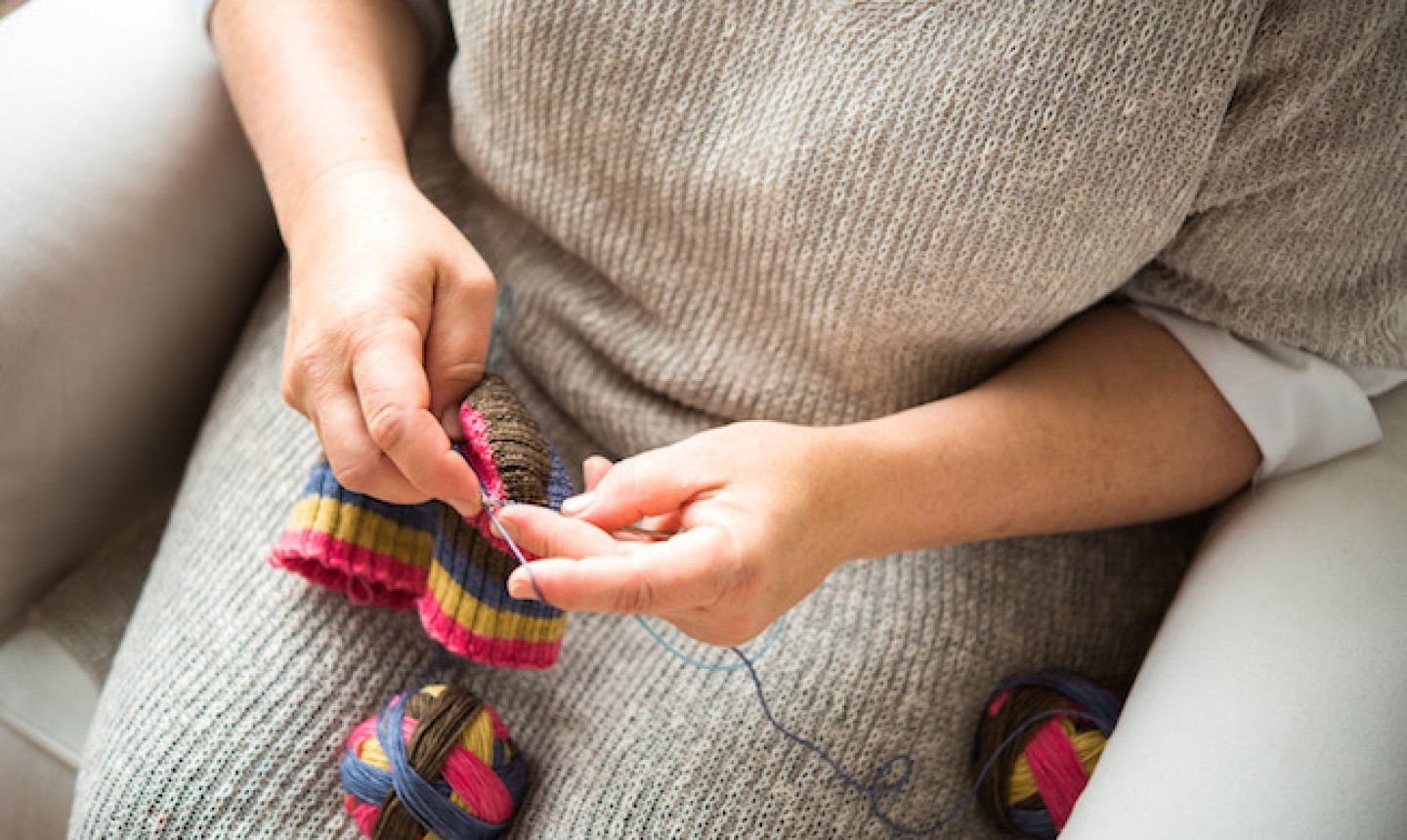 woman knitting socks