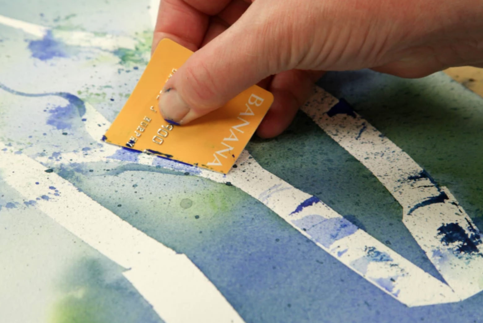 scraping watercolor with credit card