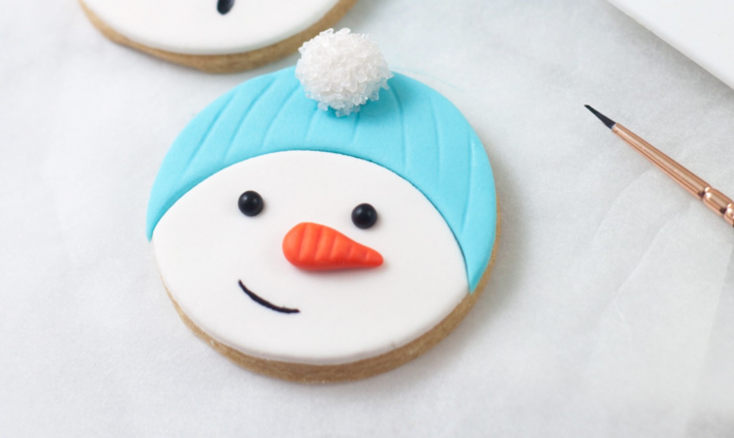 smiling snowman cookie