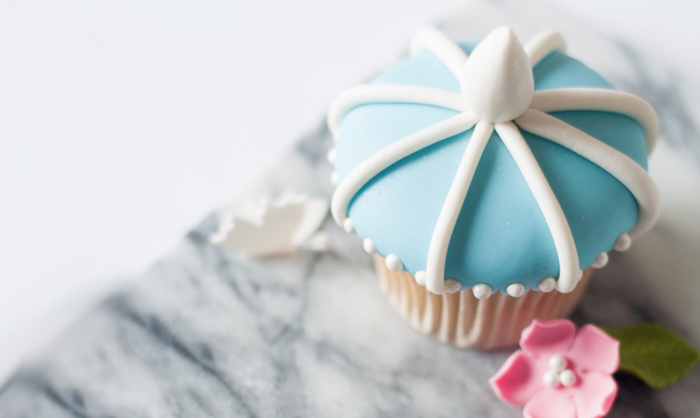 blue and white fondant cupcake