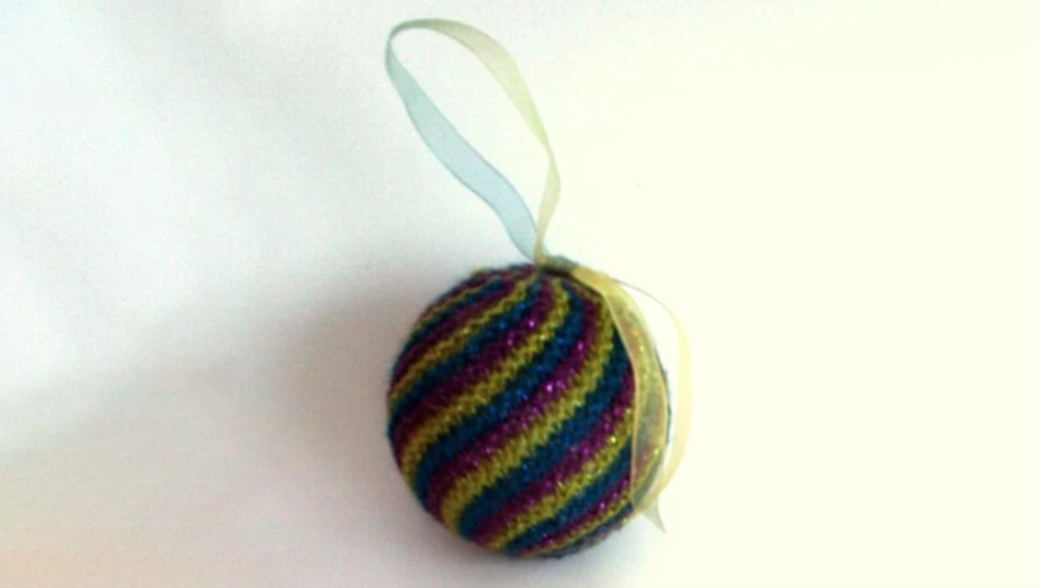knit swirled striped ornament