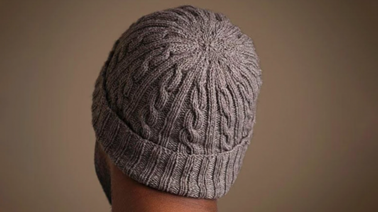 man wearing knit cabled hat