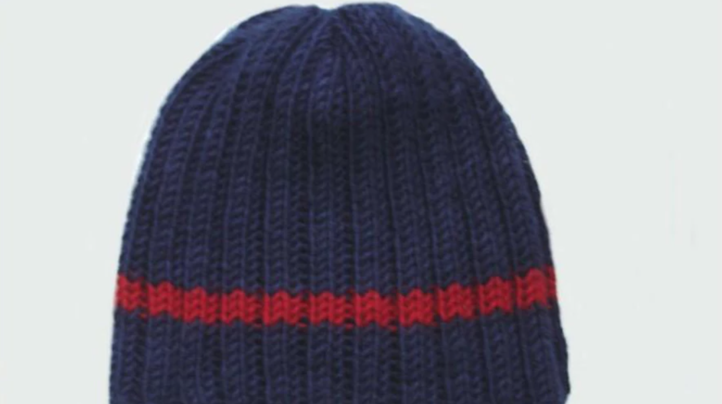 navy knit hat with red stripe