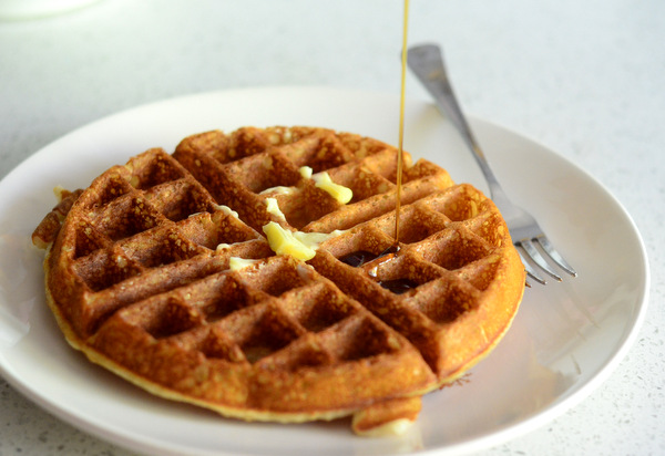 Belgian waffles with butter and syrup