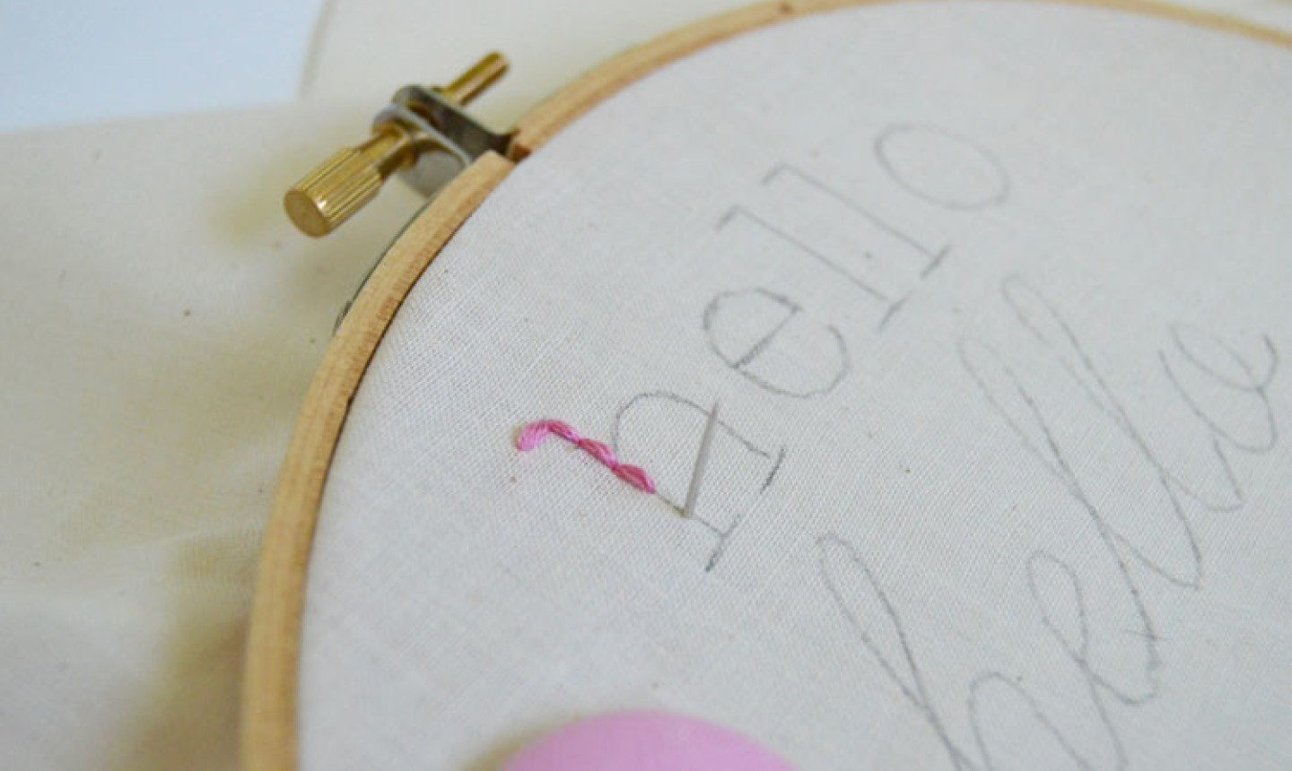 Backstitch embroider the word hello