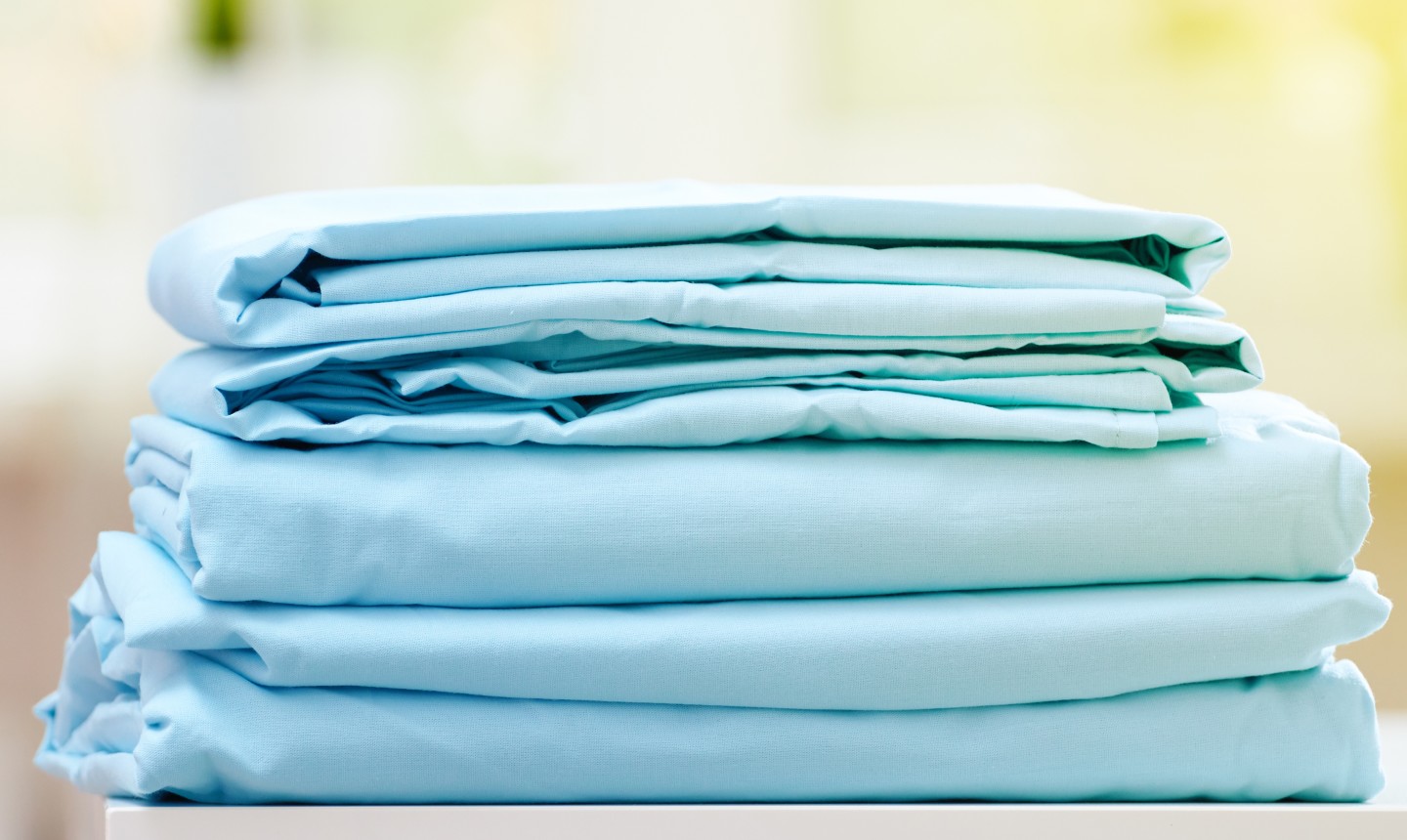 What Is a Fitted Sheet, and How Is It Different From a Top Sheet?