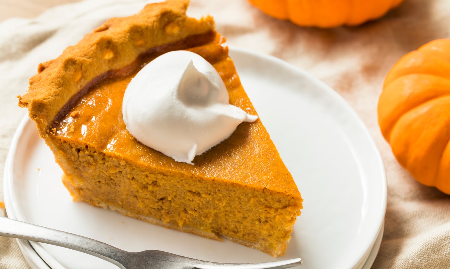 slice of pumpkin pie on a plate