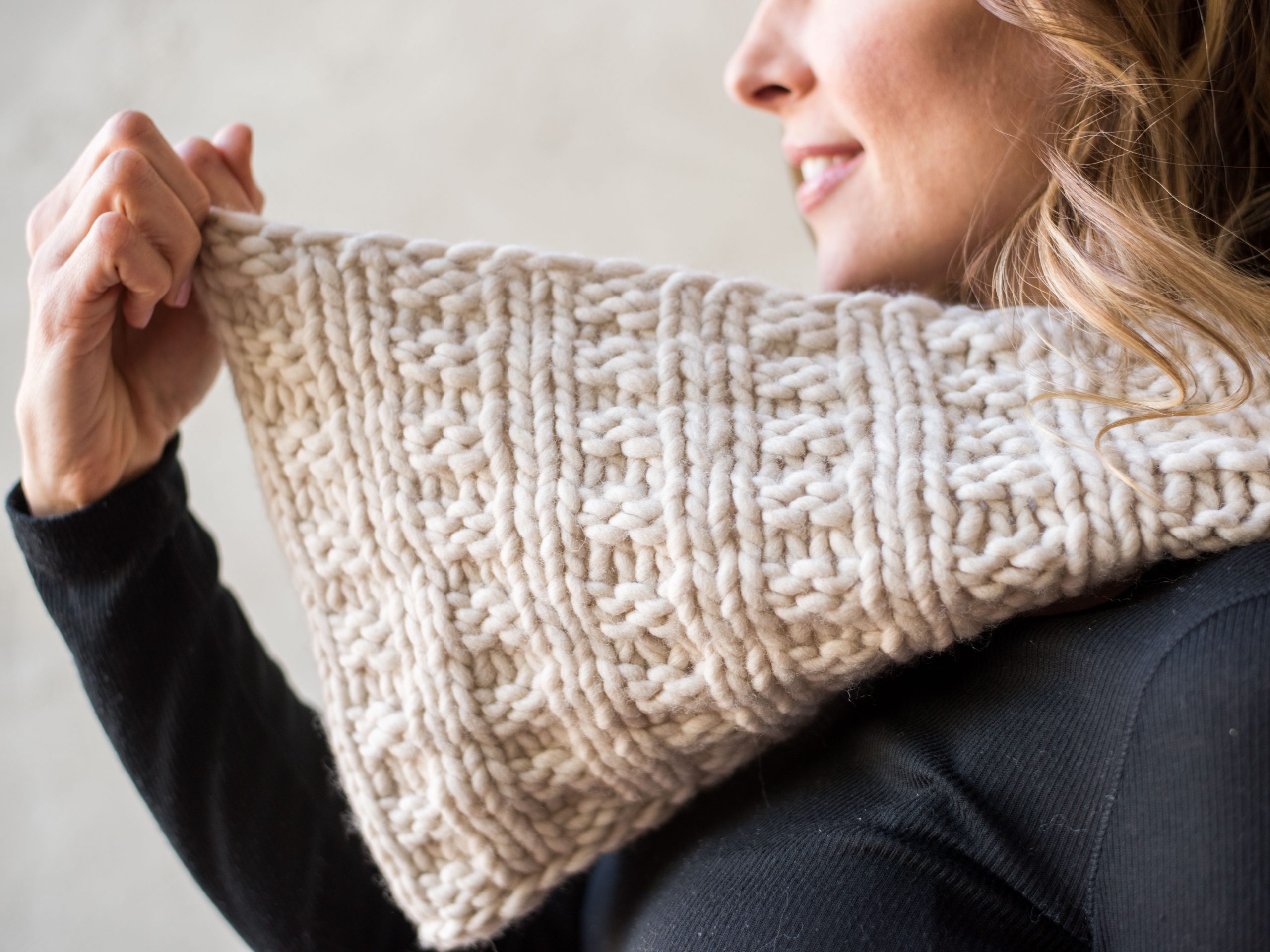 Woman wearing a chunky cowl