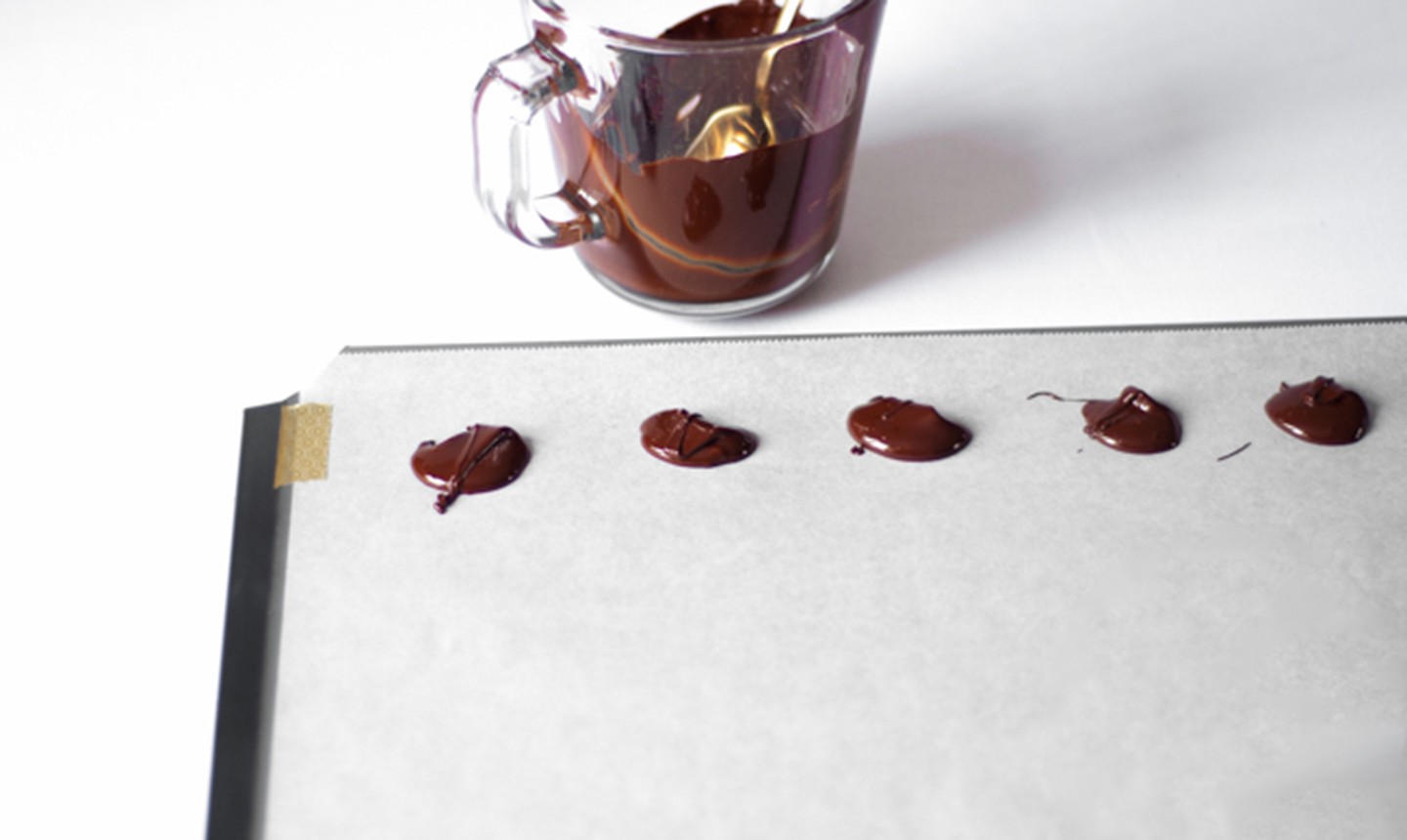 pouring candy melts onto wax paper