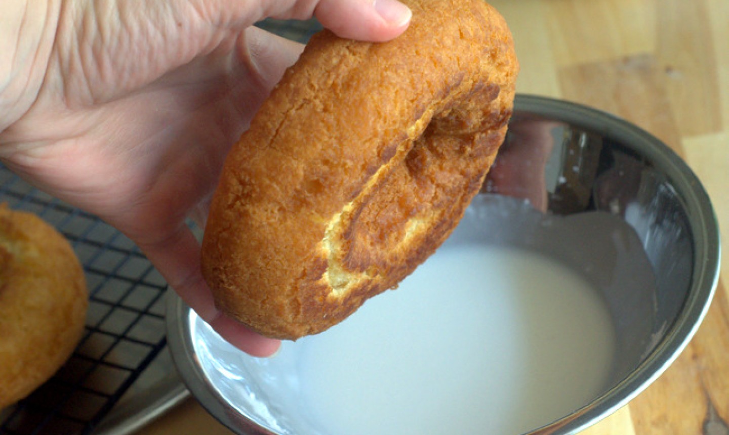 dipping donut in icing