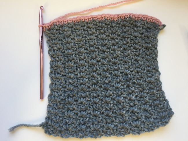 crocheting pink border to wattle stitch swatch