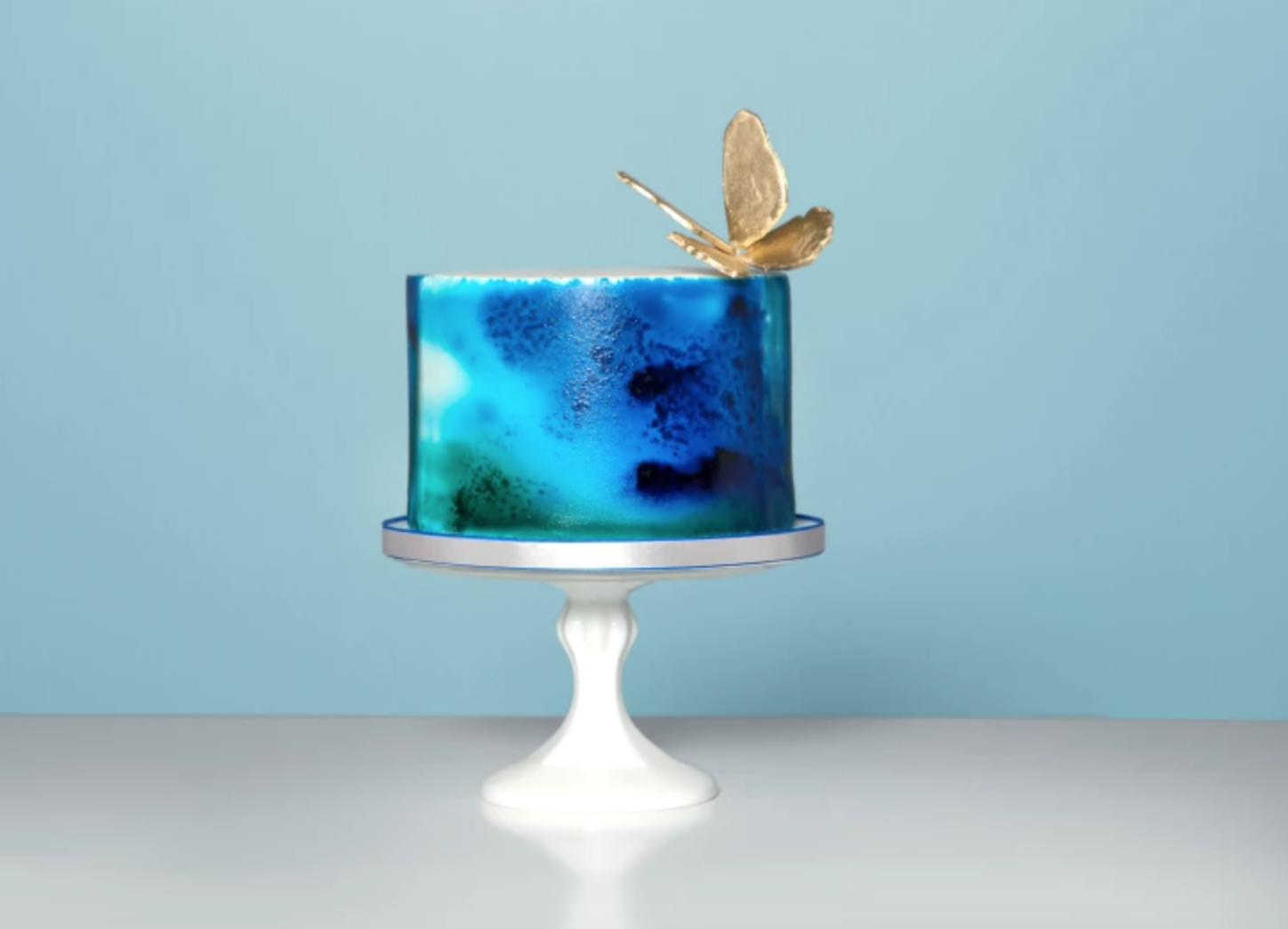 blue watercolor airbrushed cake