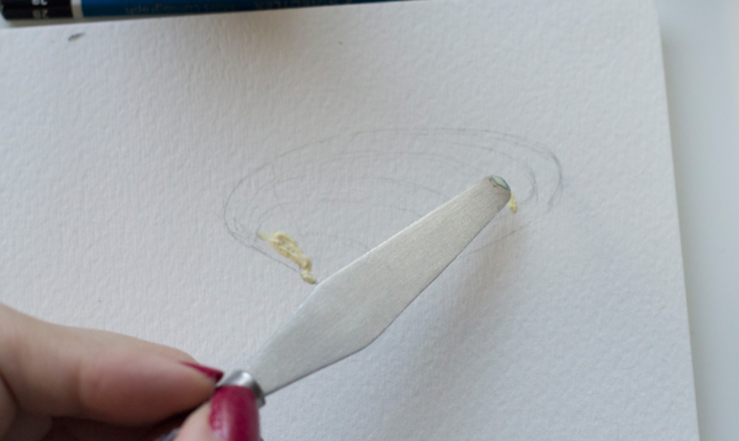 adding masking fluid to seashell drawing