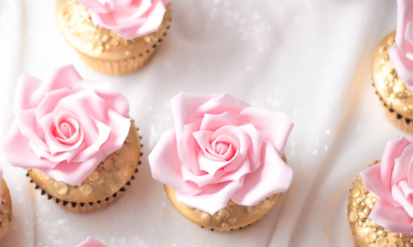 cupcakes with pink rose frosting