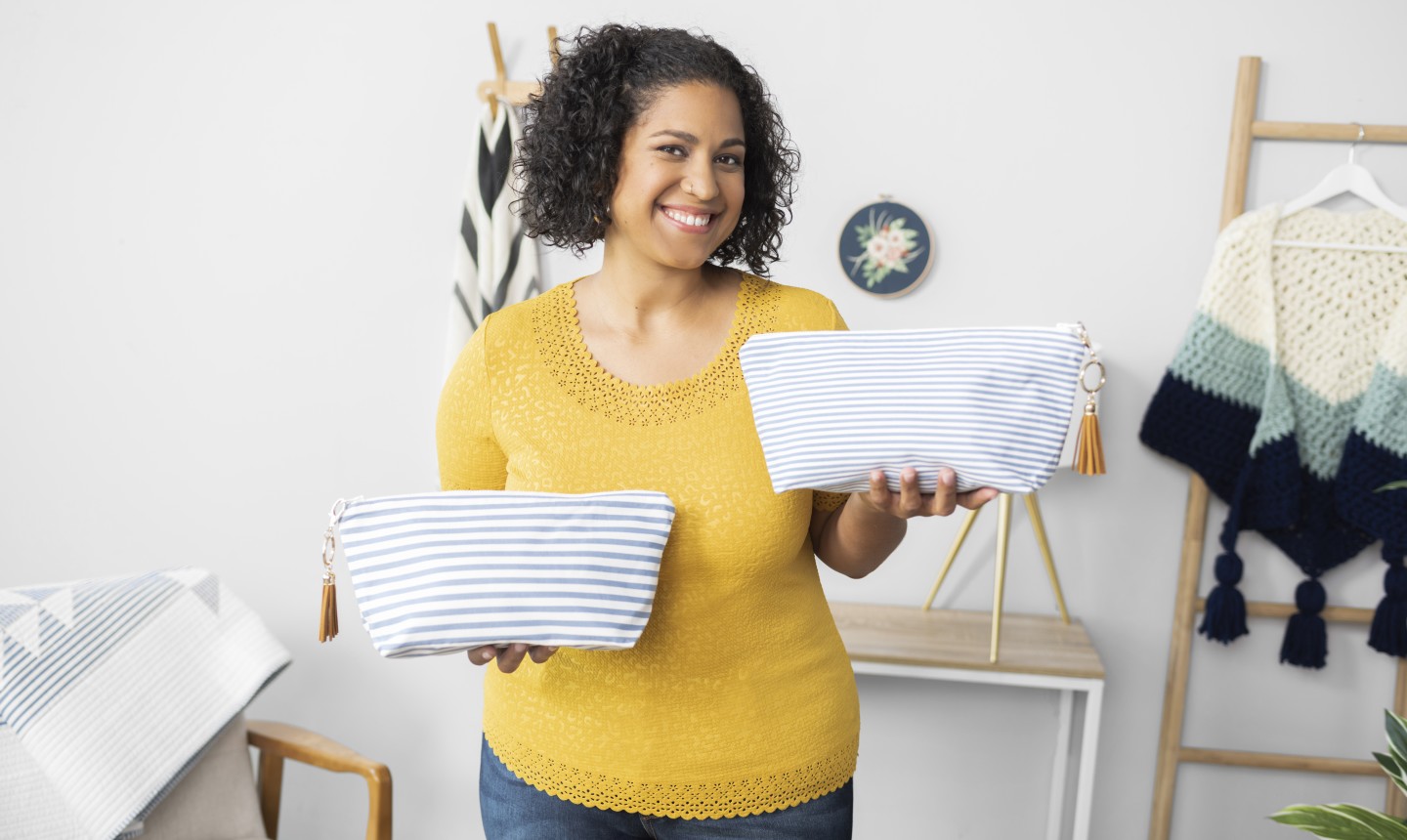 Woman holding two bags