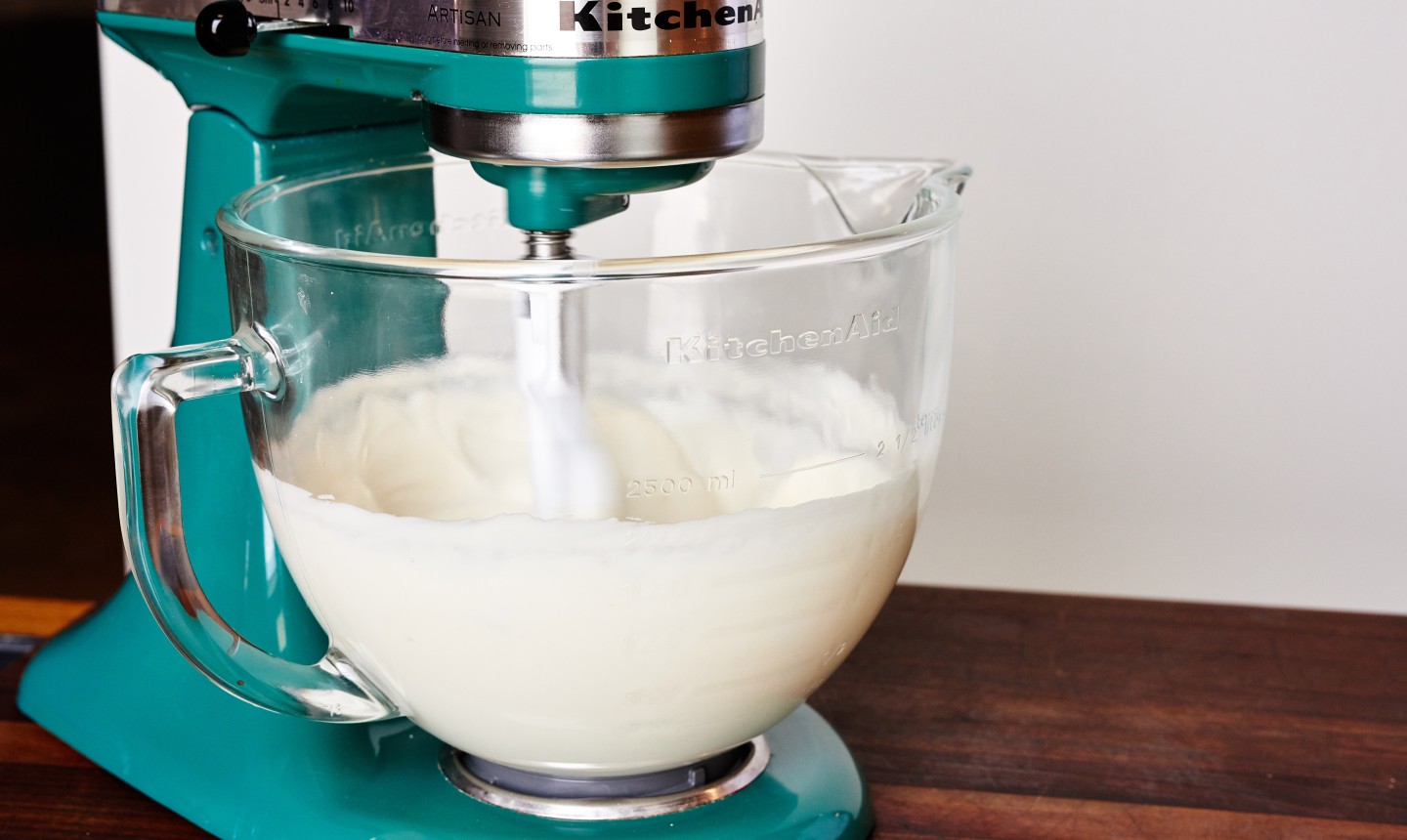 stand mixer filled with buttercream frosting