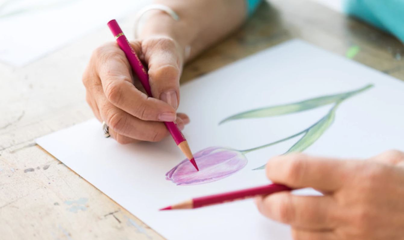 Woman using colored pencils