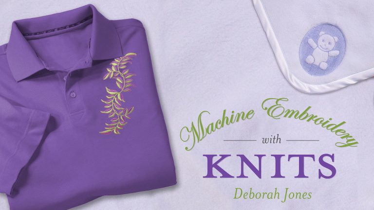 Purple polo shirt with green embroidery