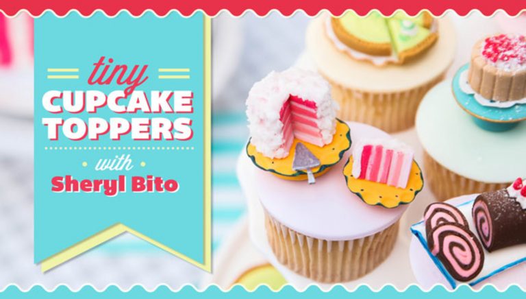 Tiny cupcake toppers on cupcakes