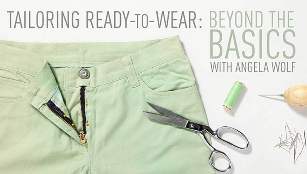 Sewing a zipper on green shorts